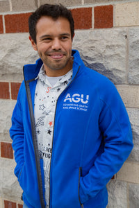 A man wears the AGU fleece